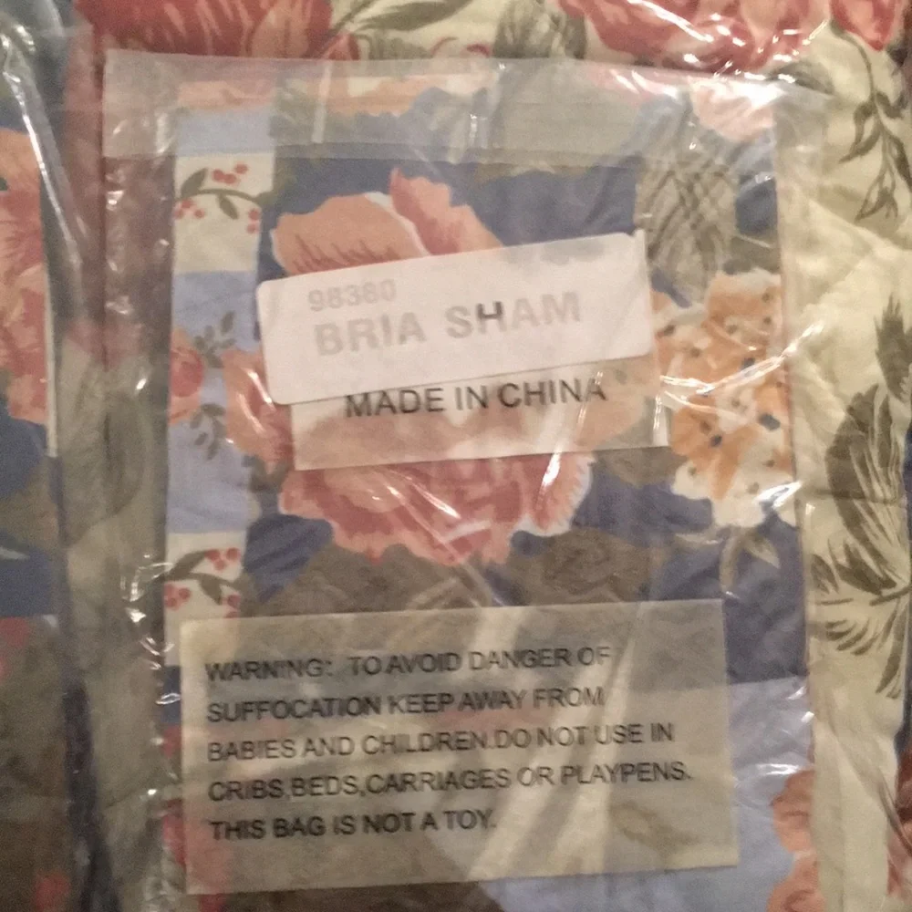 New in package, Biloxi king size reversible floral quilt with two shams